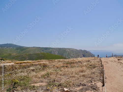 View of the coast from Cape Roca (Cabo da Roca), the westernmost point of the Sintra Mountain Range, of mainland Portugal, of continental Europe and of the Eurasian landmass photo