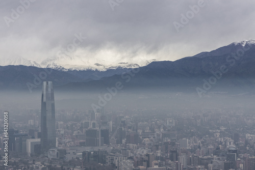 Skyline of Santiago de Chile with modern office buildings, with Cordilheiras mountains at the background.