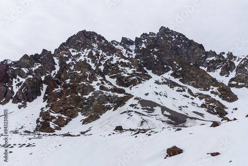 Obraz na płótnie A freezing day high in the Andes Mountains in Chile, with mountains covered in snow. w salonie