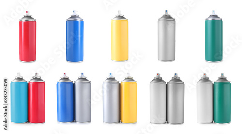 Different spray paint cans isolated on white, set