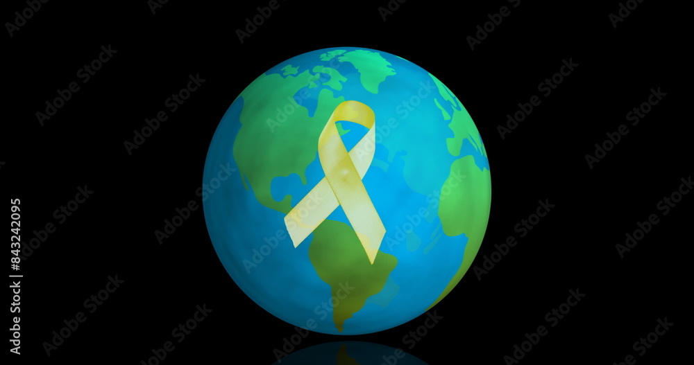 Image of yellow ribbon over globe on black background, copy space Image of yellow ribbon over globe on black background, copy space