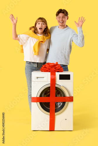Young couple with gift wash...