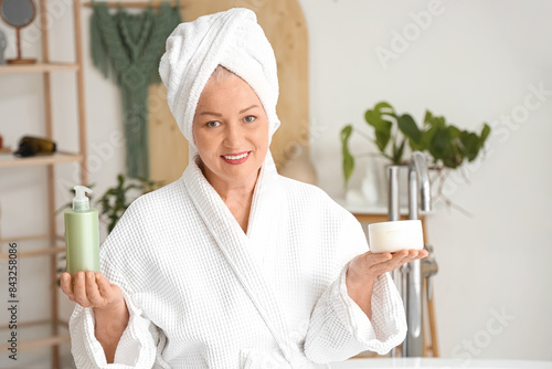 Mature woman with hair care...
