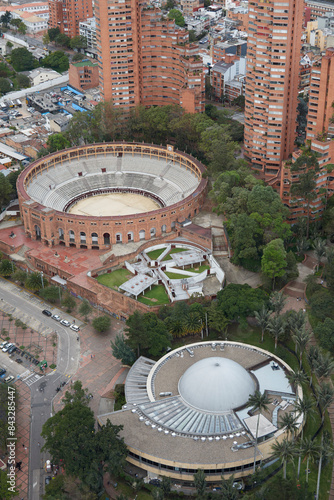 Urban Panorama: An aerial view of Bogotá from the Torre Colpatria reveals the sprawling cityscape. The Plaza Cultural La Santamaría stands out among iconic buildings photo