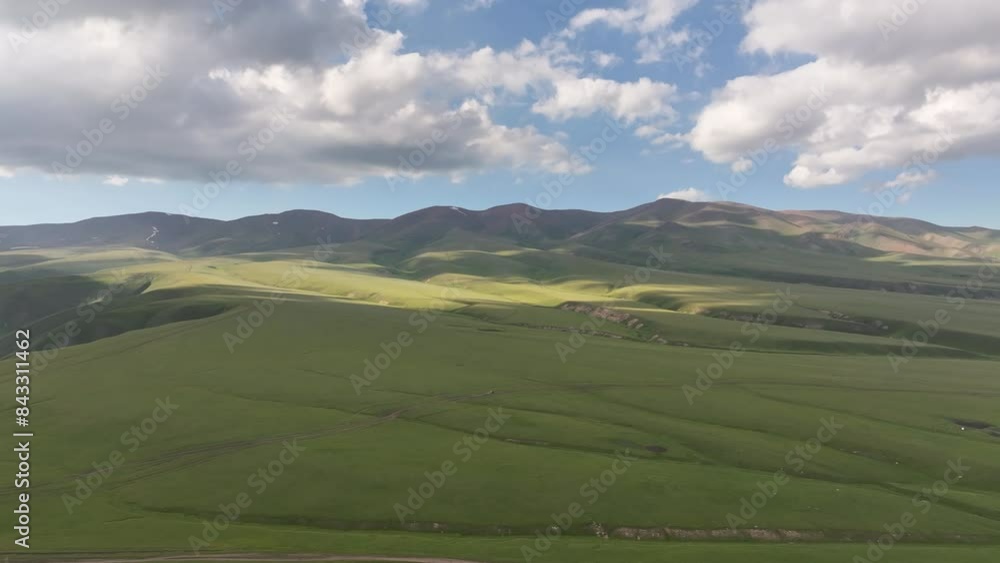 View from a quadcopter of a high mountain plateau in southeastern Kazakhstan on a cloudy summer evening View from a quadcopter of a high mountain plateau in southeastern Kazakhstan on a cloudy summer evening
