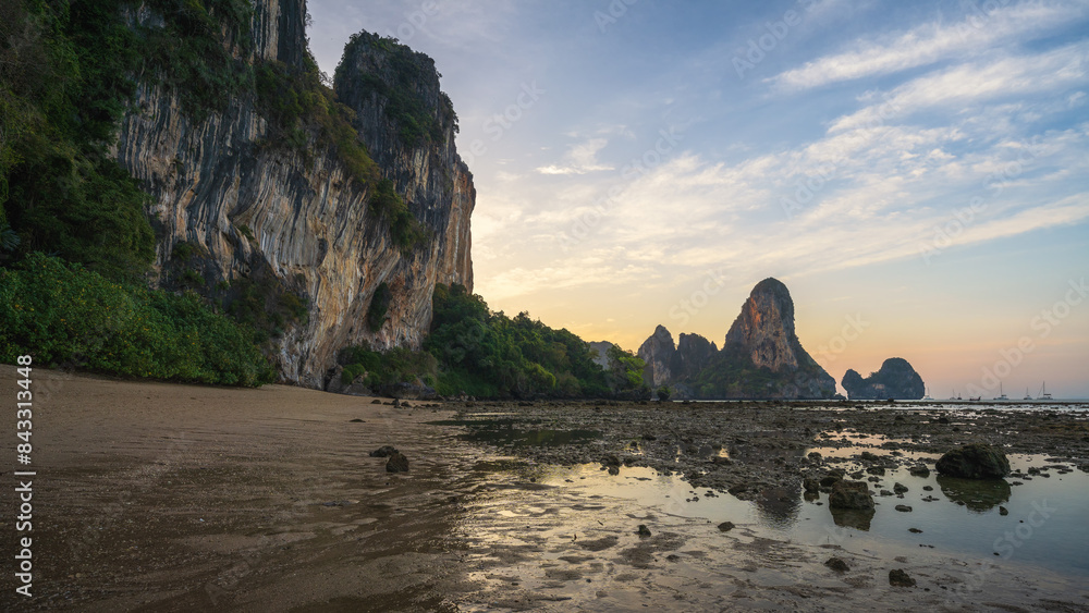 sunset at tonsai beach in railay in krabi in thailand