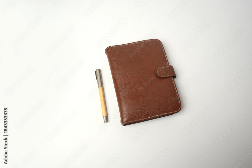 leather cover dairy or notebook with pen isolated leather cover dairy or notebook with pen isolated