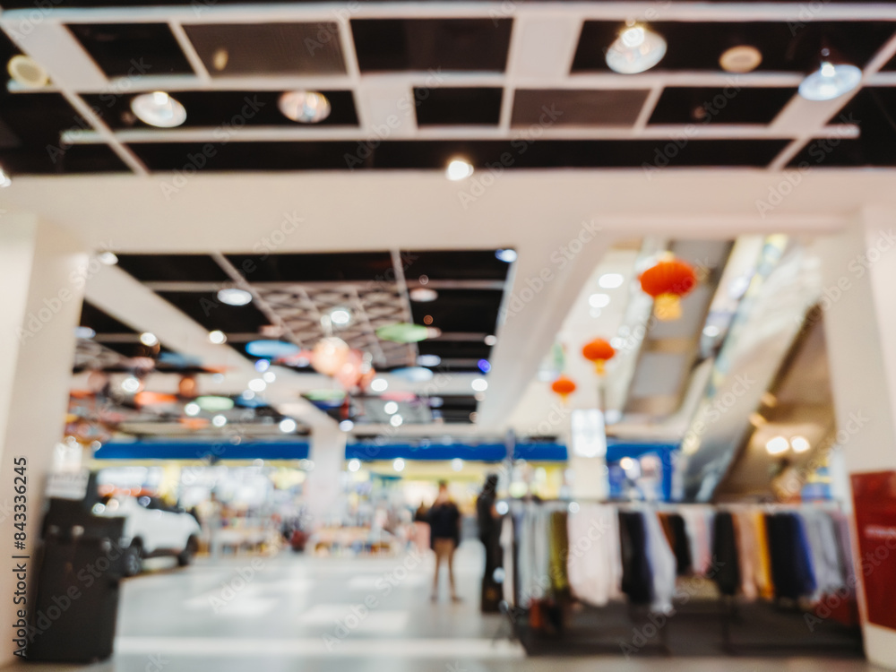 Fototapeta premium Beautiful blurred photo of a shopping mall with rounded bokeh light. Suitable for background.