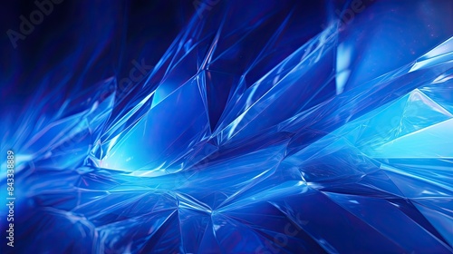 Dynamic blue polygon background with swirling motion and neon highlights