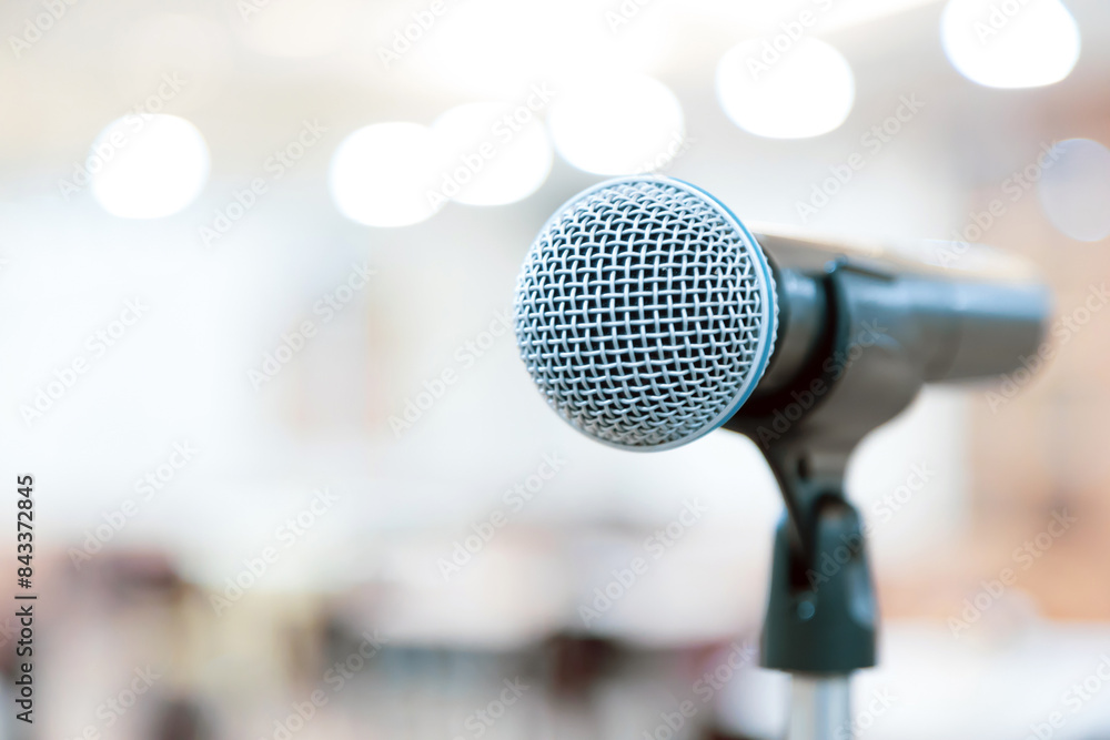 Microphone for press conference speaker report interview concepts or broadcasting public speaking speech presentation stage performance and reporter news with empty copy space background. Microphone for press conference speaker report interview concepts or broadcasting public speaking speech presentation stage performance and reporter news with empty copy space background.
