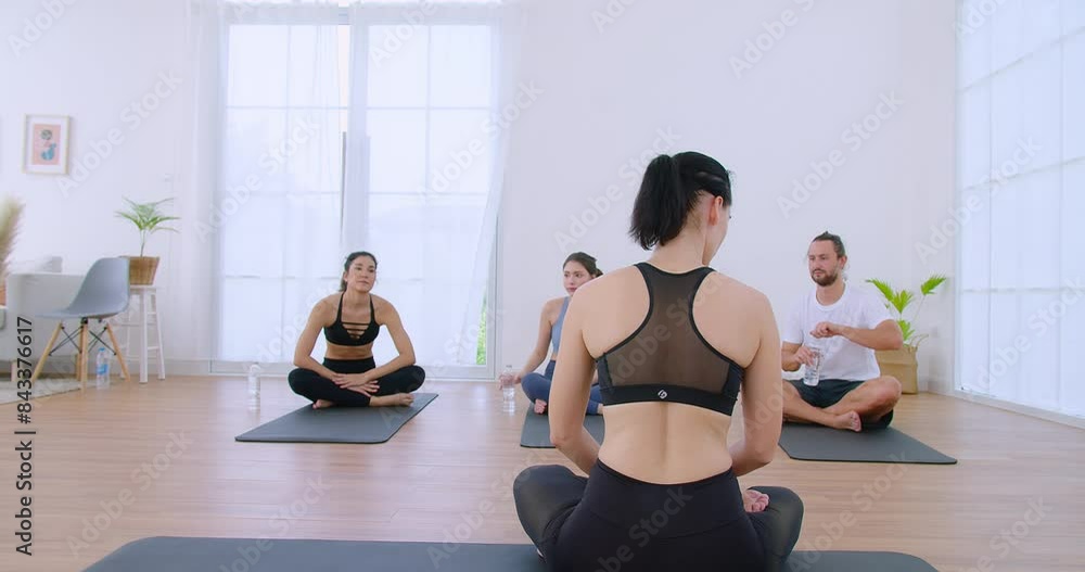 Group of people practicing yoga Class in Bright Modern Studio with Natural Light, Featuring Diverse Participants Engaged in Relaxing and Mindful Yoga Poses on Mats Group of people practicing yoga Class in Bright Modern Studio with Natural Light, Featuring Diverse Participants Engaged in Relaxing and Mindful Yoga Poses on Mats