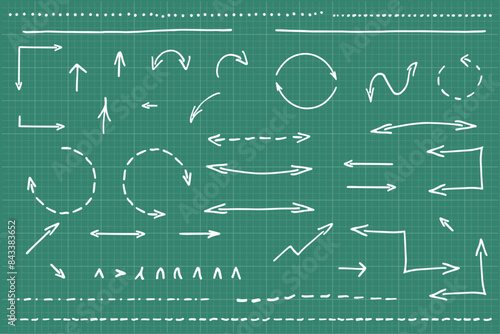 Hand drawn vector arrows on the green grid background on graph paper