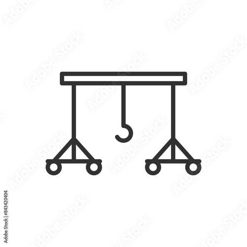 A gantry crane on wheels, linear icon. Hoisting production crane. Line with editable stroke