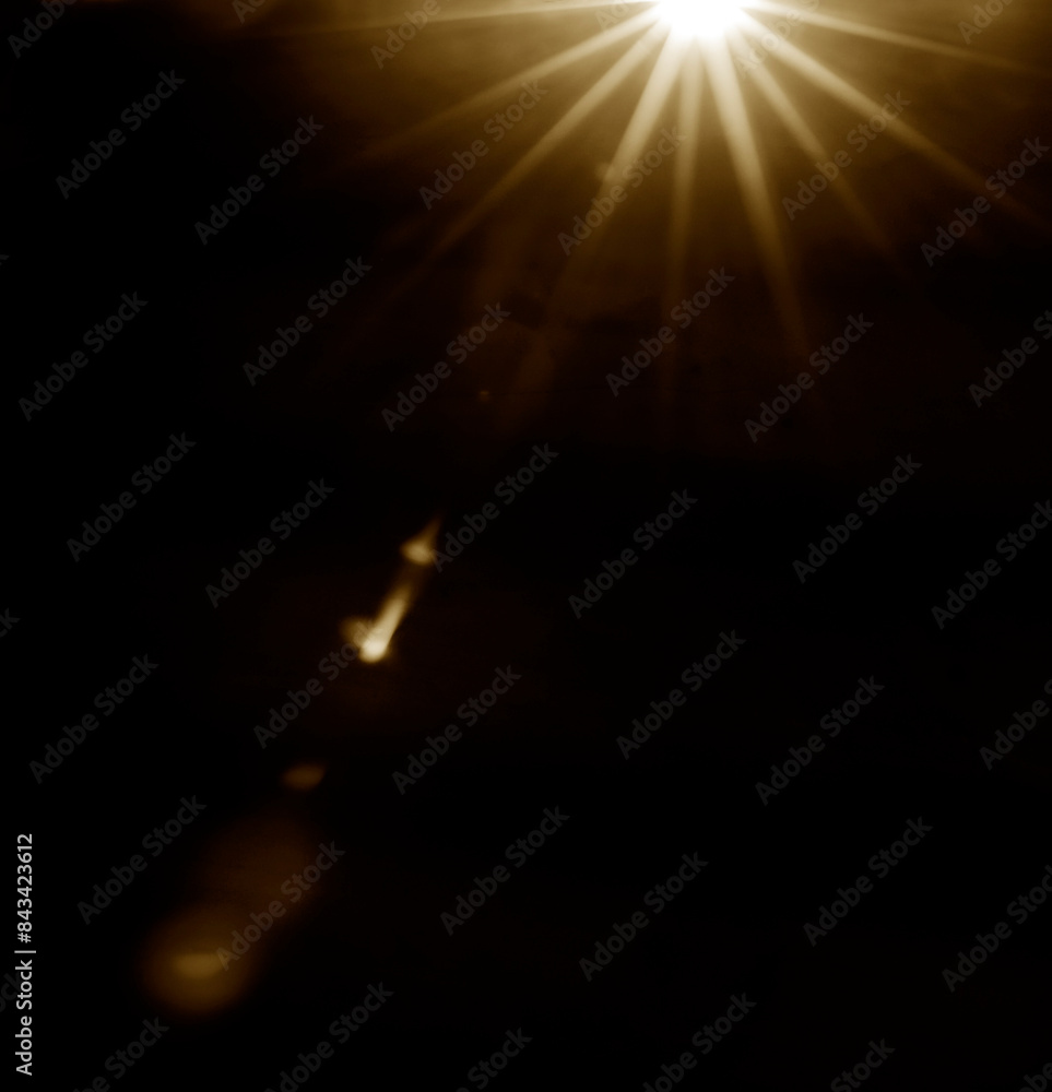 lens flare effects for overlay designs or screen blending. Abstract sunburst, digital flare, iridescent glaze over black background. blurred bokeh background with bright sun rays. lens flare effects for overlay designs or screen blending. Abstract sunburst, digital flare, iridescent glaze over black background. blurred bokeh background with bright sun rays.