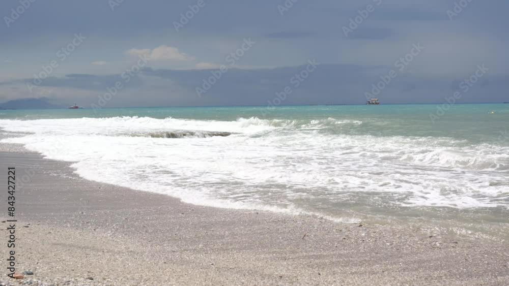 Mediterranean seaside coast with two ships in stormy weather in one evening. Mediterranean seaside coast with two ships in stormy weather in one evening.