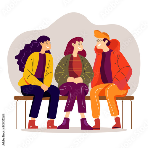 A group of three friends gathered and chatting on Friendship day