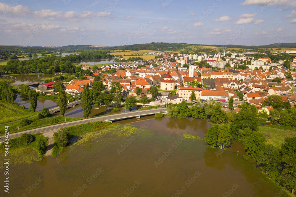Fototapeta premium Aerial view of flooded Radbuza river in city Dobrany. West Bohemia, Czech republic, European union.