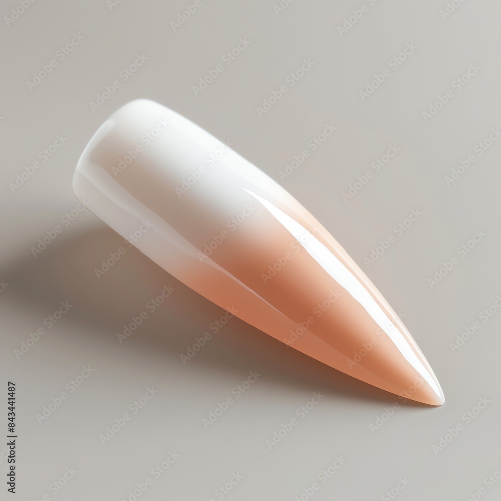 Closeup of a single white and peach ombre nail tip. Closeup of a single white and peach ombre nail tip.