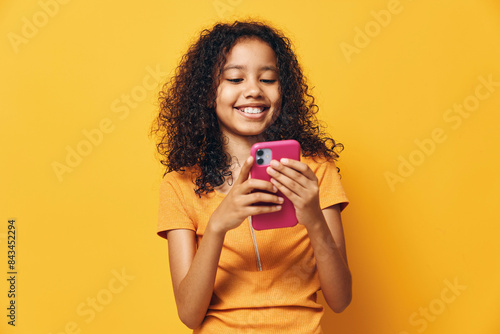 Tableau sur toile Online woman smartphone cellphone mobile message phone cell girl background blac