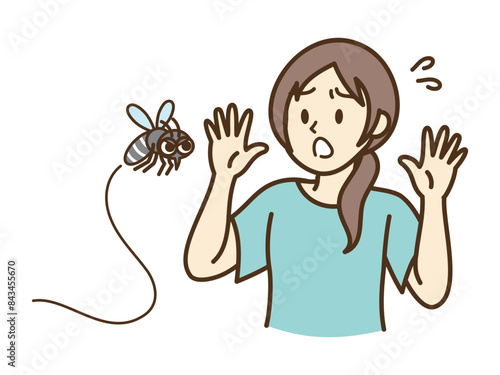 害虫_蚊を嫌がる女性