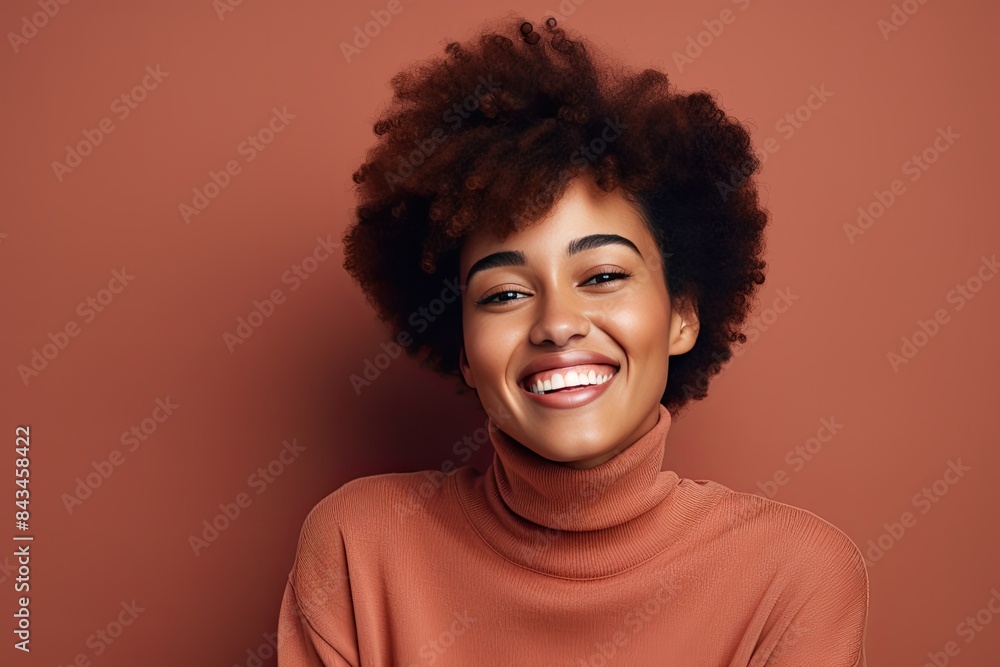 Beautiful black woman smiling and having in studio shot. Beautiful black woman smiling and having in studio shot.