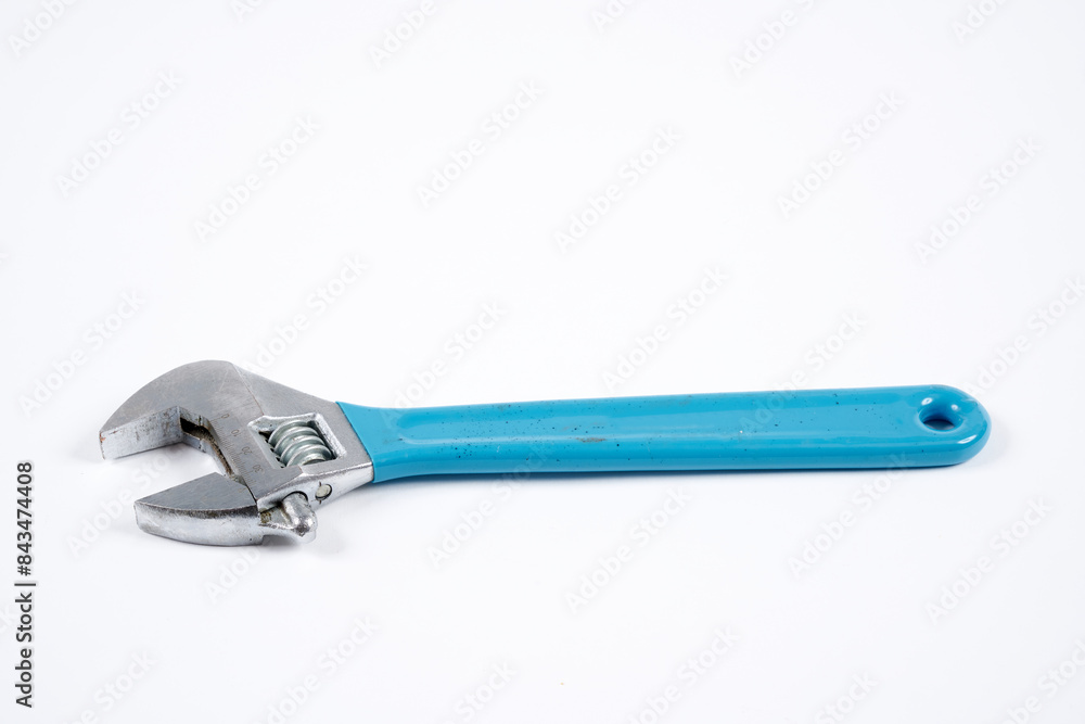 Adjustable wrench on an isolated white background. Adjustable wrench on an isolated white background.