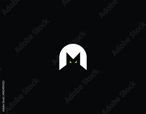 Letter M Bat Man eye logo design. 