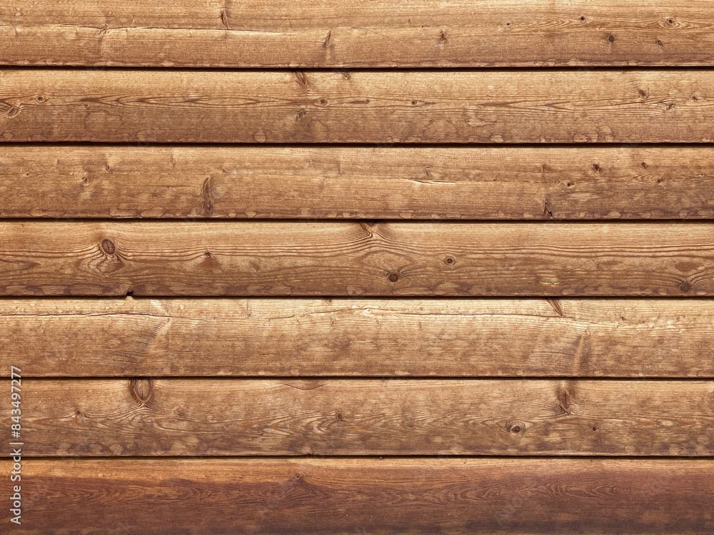 Naklejka premium Natural wood texture background. This wooden panel features a beautiful dark pattern and hardwood facade texture