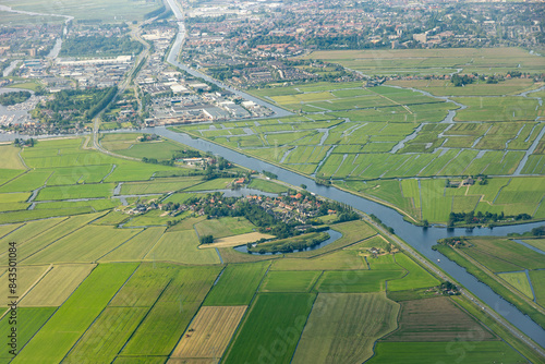 Aerial image of the defence line of Amsterdam, stelling, with century old historic brick forts surrounded by moats, sluices, rivers and canals. Typical Dutch landscape with grass fields and meadows