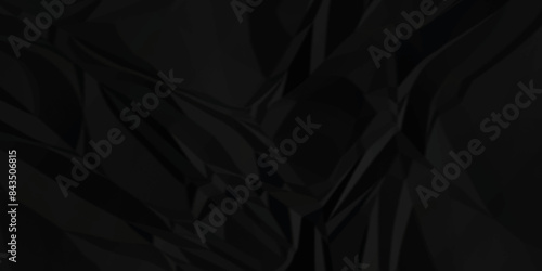 Black crumpled paper texture . wrinkled paper texture. Crumpled and top view textures can be used for background of text or any contents .	
