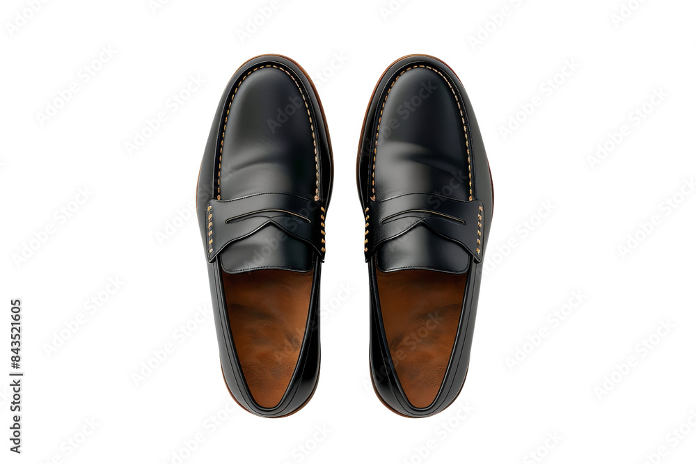 Top view of classic black leather loafers with brown interior, perfect for formal and casual settings, showcasing elegance and timeless style. Top view of classic black leather loafers with brown interior, perfect for formal and casual settings, showcasing elegance and timeless style.