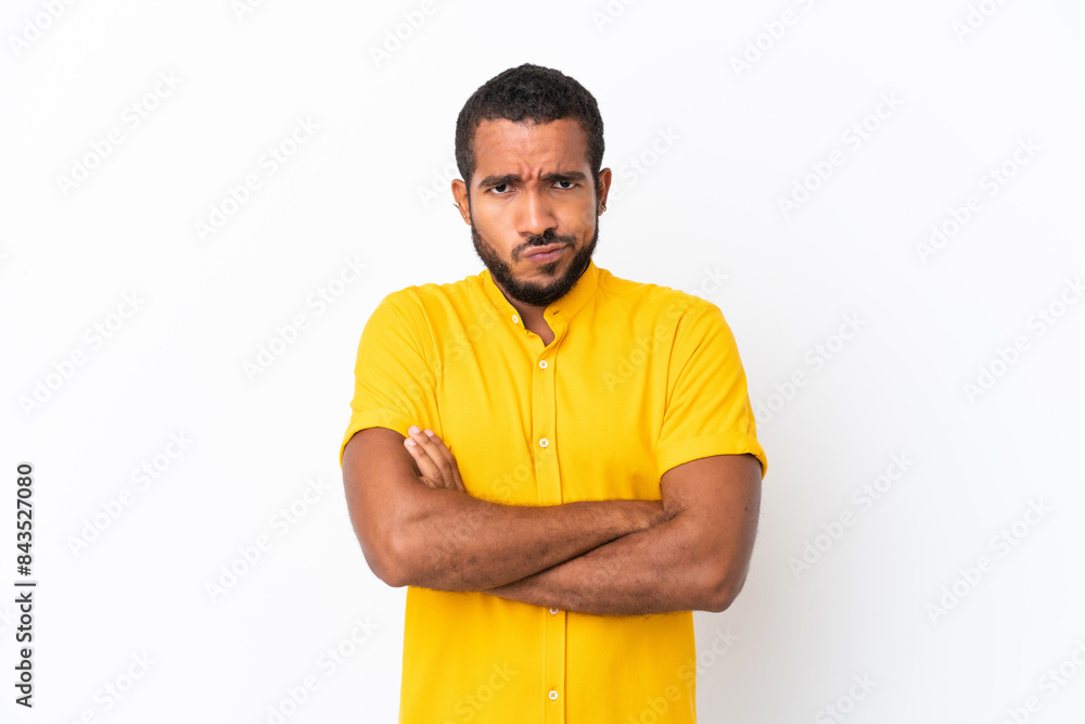 Young Ecuadorian man isolated on white background with unhappy expression Young Ecuadorian man isolated on white background with unhappy expression