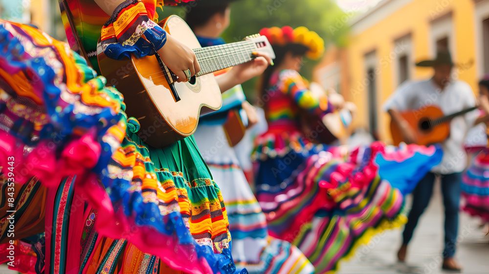 © Ployker - Mexican traditional dance and music performance in colorful costumes, closeup of guitar players during fiesta parade on street background. © Ployker - Mexican traditional dance and music performance in colorful costumes, closeup of guitar players during fiesta parade on street background.