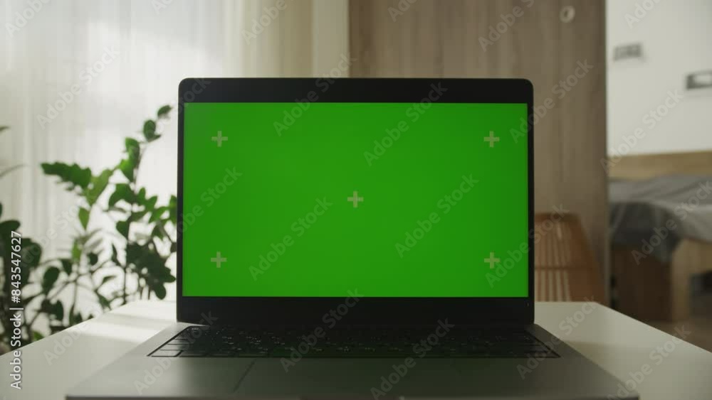 Dolly Zoom Laptop with green screen on desk Dolly Zoom Laptop with green screen on desk