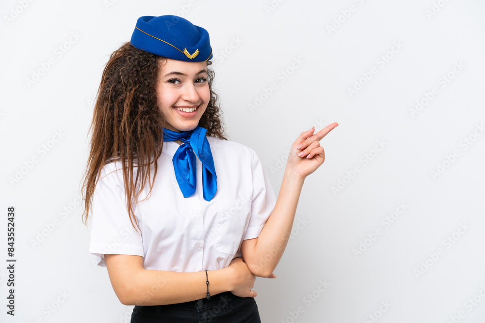 Airplane stewardess Arab woman isolated on white background pointing finger to the side Airplane stewardess Arab woman isolated on white background pointing finger to the side