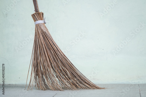 Broomstick is a broom made from palm fronds commonly used for sweeping by people in Asia, including Indonesia.