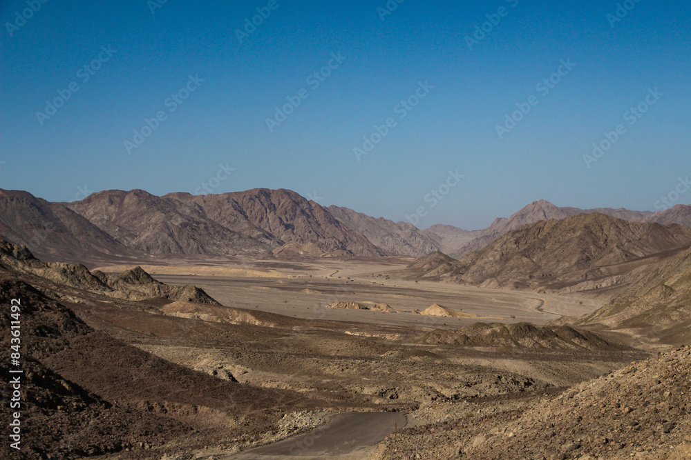 Scenic panoramic view of a valley and desert mountains in Dahab area of Egypt Scenic panoramic view of a valley and desert mountains in Dahab area of Egypt