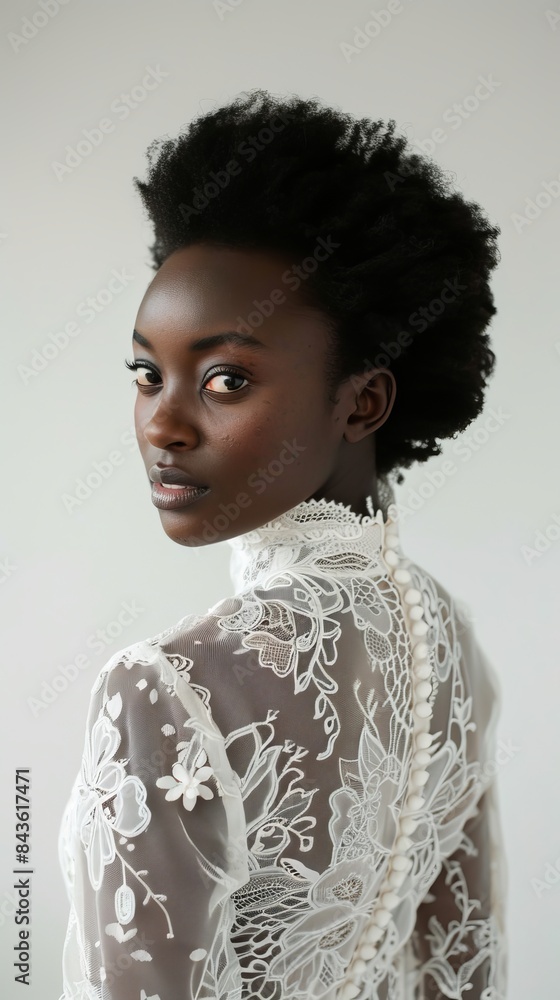 dark-skinned woman in delicate lace clothes on a white background. dark-skinned woman in delicate lace clothes on a white background.