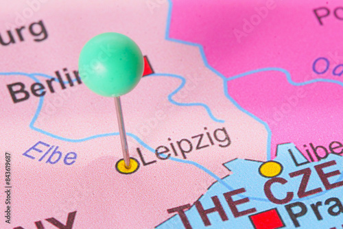 Route with green pin to Leipzig on a city map. Concept on the adventure, discovery, navigation, communication, logistics, geography, transport and travel topics.