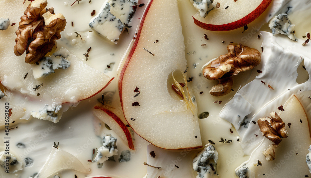 A close up of a fruit salad with a wedge of apple and walnuts A close up of a fruit salad with a wedge of apple and walnuts