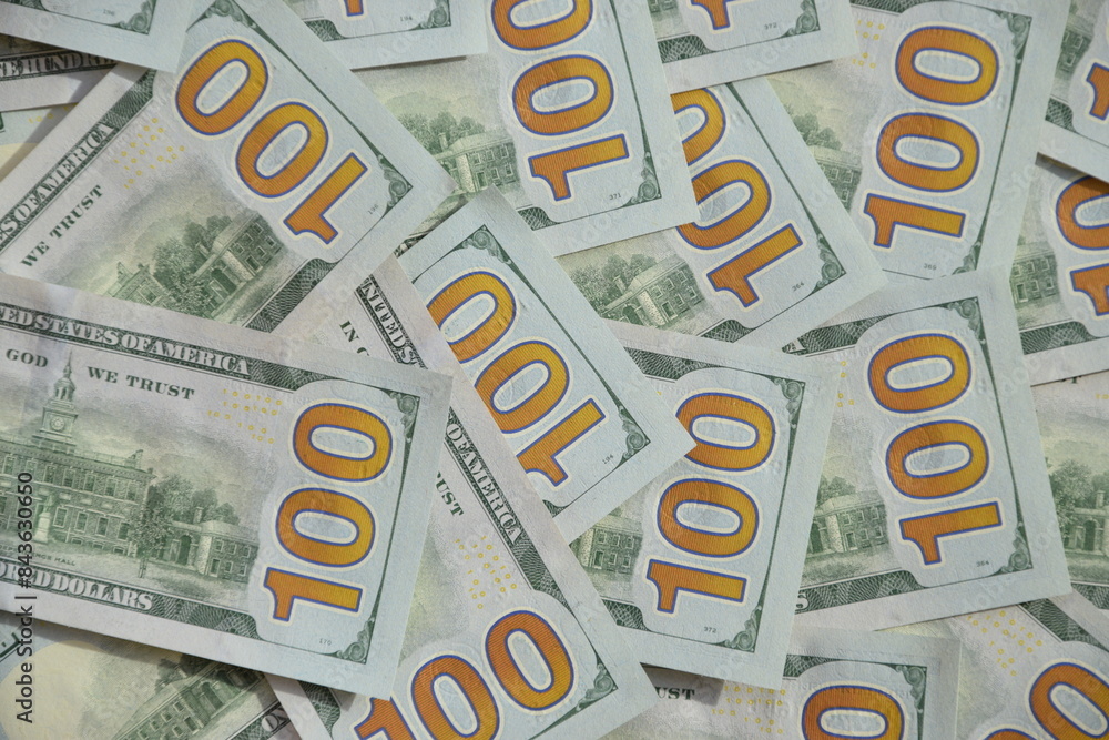 Processed collage of many US hundred dollar bills banknotes texture. Background for banner Processed collage of many US hundred dollar bills banknotes texture. Background for banner
