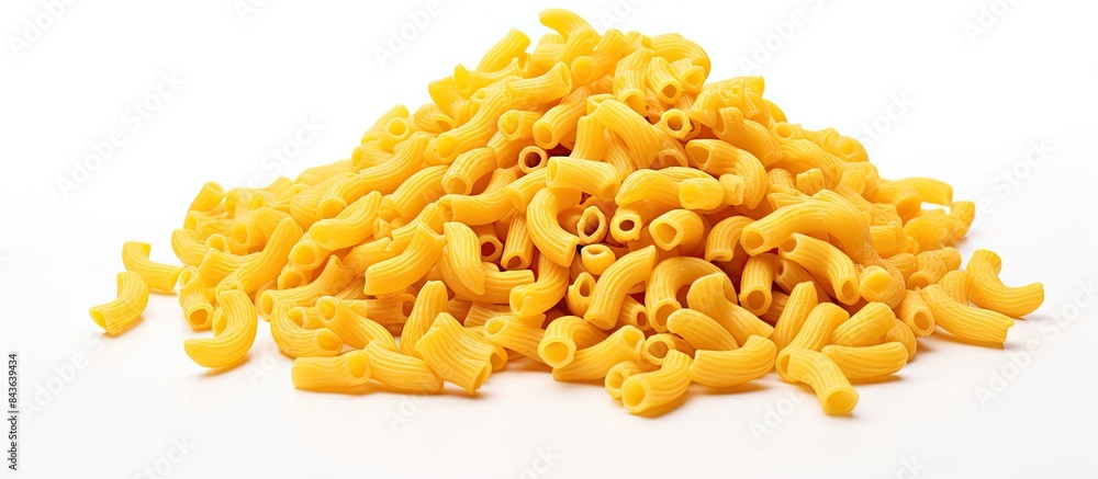 A side view of a bunch of dry macaroni pasta on a white background with plenty of space for copy A side view of a bunch of dry macaroni pasta on a white background with plenty of space for copy