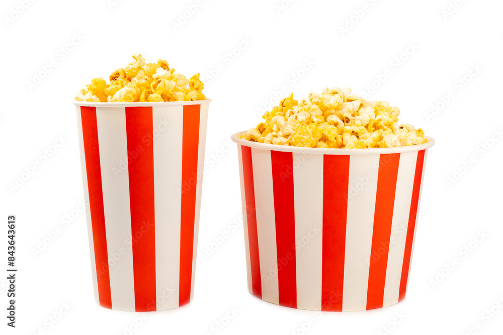 Popcorn box. Red and white striped buckets of popcorn isolated on white background. Cinema and entertainment concept. Movie night with popcorn. Cheesy popcorn. Delicious appetizer, snack. Popcorn box. Red and white striped buckets of popcorn isolated on white background. Cinema and entertainment concept. Movie night with popcorn. Cheesy popcorn. Delicious appetizer, snack.