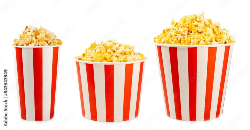 Popcorn box. Red and white striped buckets of popcorn isolated on white background. Cinema and entertainment concept. Movie night with popcorn. Cheesy popcorn. Delicious appetizer, snack. Popcorn box. Red and white striped buckets of popcorn isolated on white background. Cinema and entertainment concept. Movie night with popcorn. Cheesy popcorn. Delicious appetizer, snack.