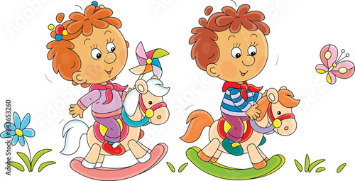 Funny little girl and boy merrily playing on rocking-horses among scattered toys on a playground in a kindergarten, vector cartoon illustration on a white background