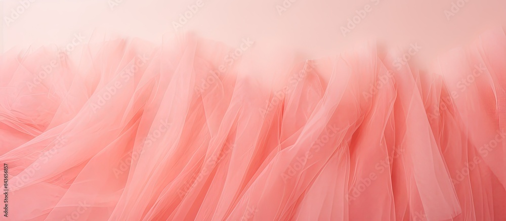 A pink tulle fabric texture is seen from a top down view set against a coral background This trendy feminine flat lay features a rose colored tutu skirt and serves as a glossy backdrop for text sign A pink tulle fabric texture is seen from a top down view set against a coral background This trendy feminine flat lay features a rose colored tutu skirt and serves as a glossy backdrop for text sign