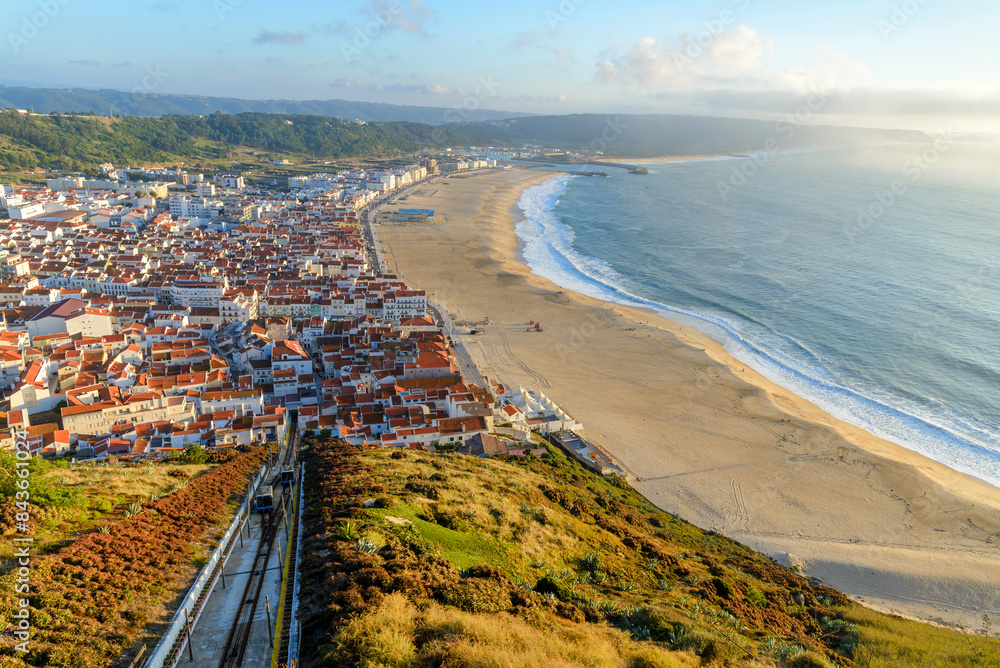 Aerial view of Nazare city and Praia da Nazare Beach, Portugal Aerial view of Nazare city and Praia da Nazare Beach, Portugal
