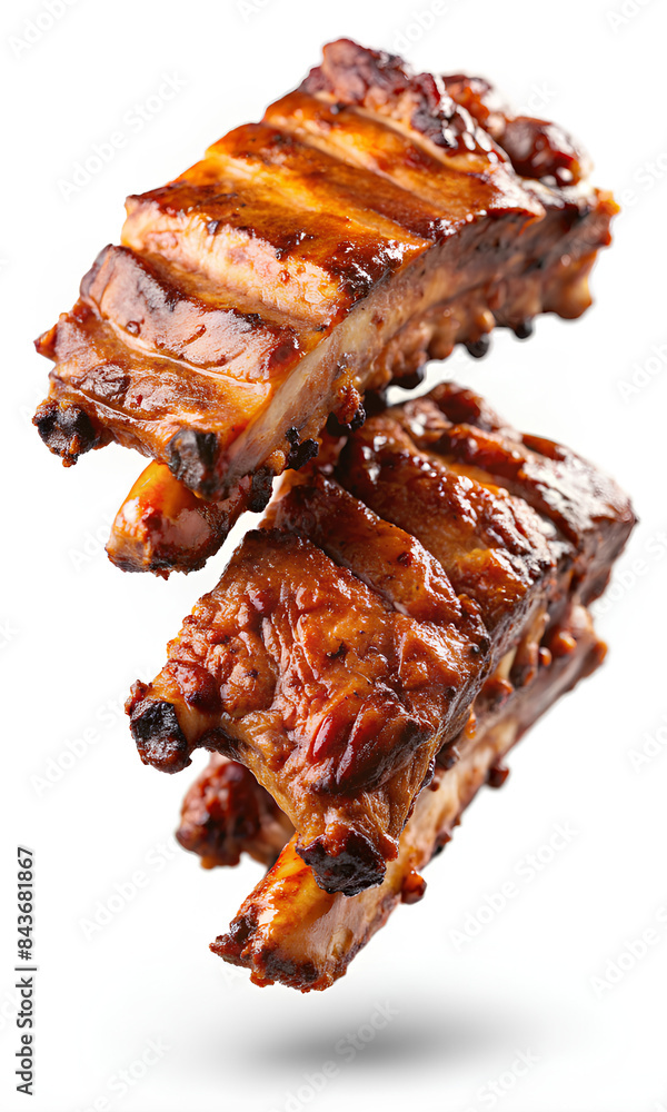 juicy barbecued pork ribs flying on white background, clipping path, selective focus juicy barbecued pork ribs flying on white background, clipping path, selective focus