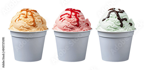 Ice cream trio in white paper cups, topped with caramel, strawberry, and chocolate syrup respectively. photo