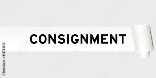 Ripped gray paper background that have word consignment under torn part